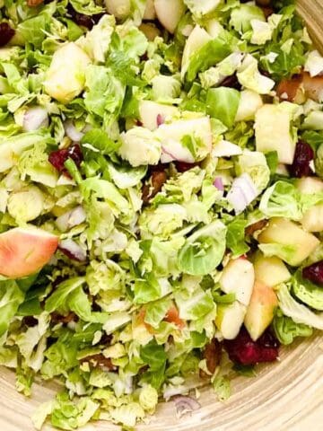 A bowl of brussels sprouts salad.
