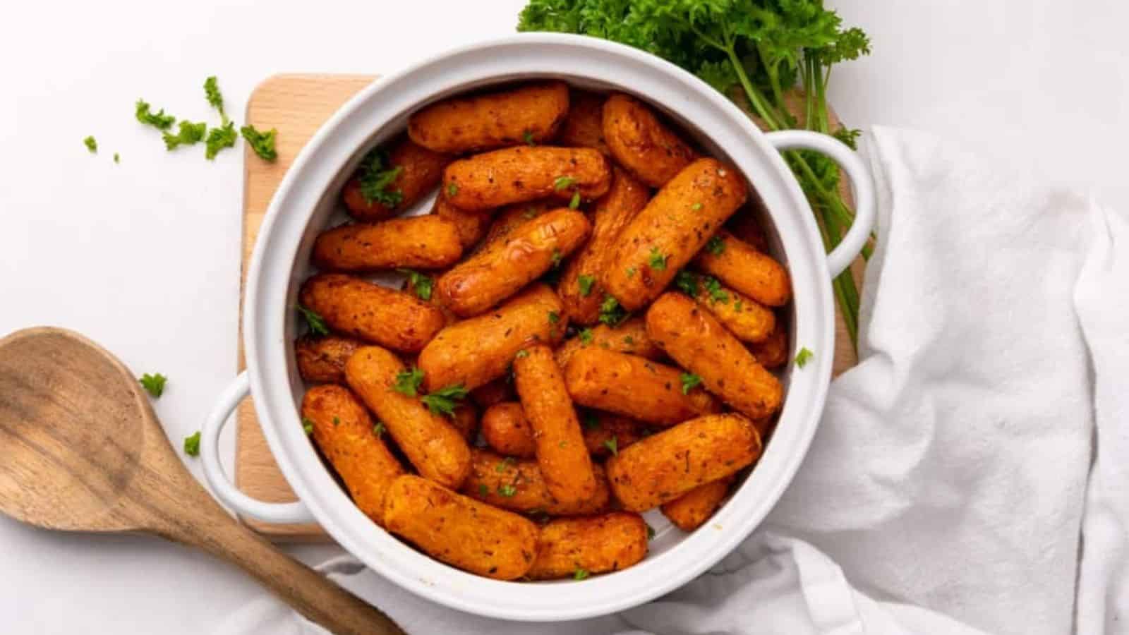 Overhead image of air fryer baby carrots.