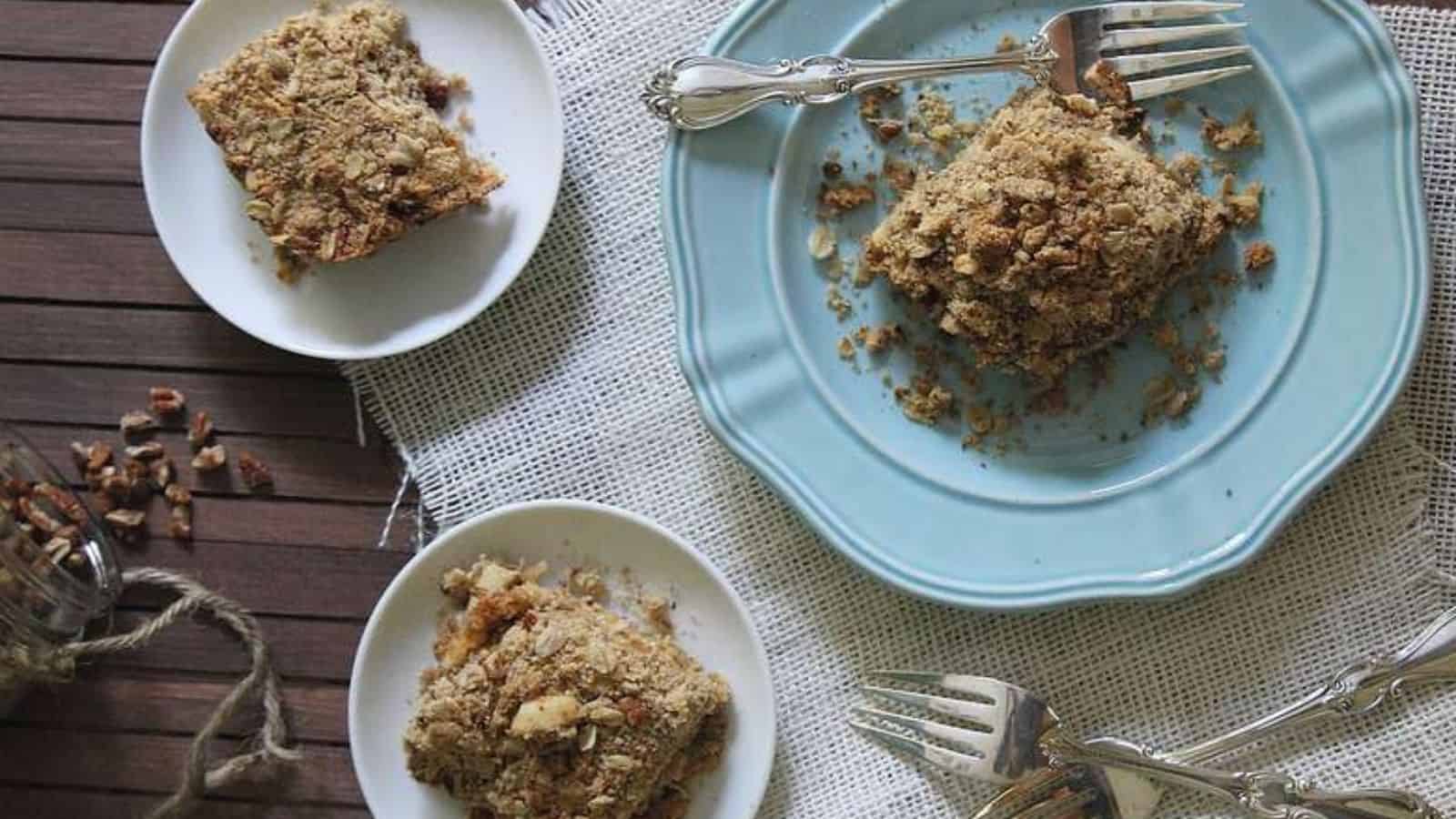 Overhead image of three plates wiith apple cheddar crumble bars.