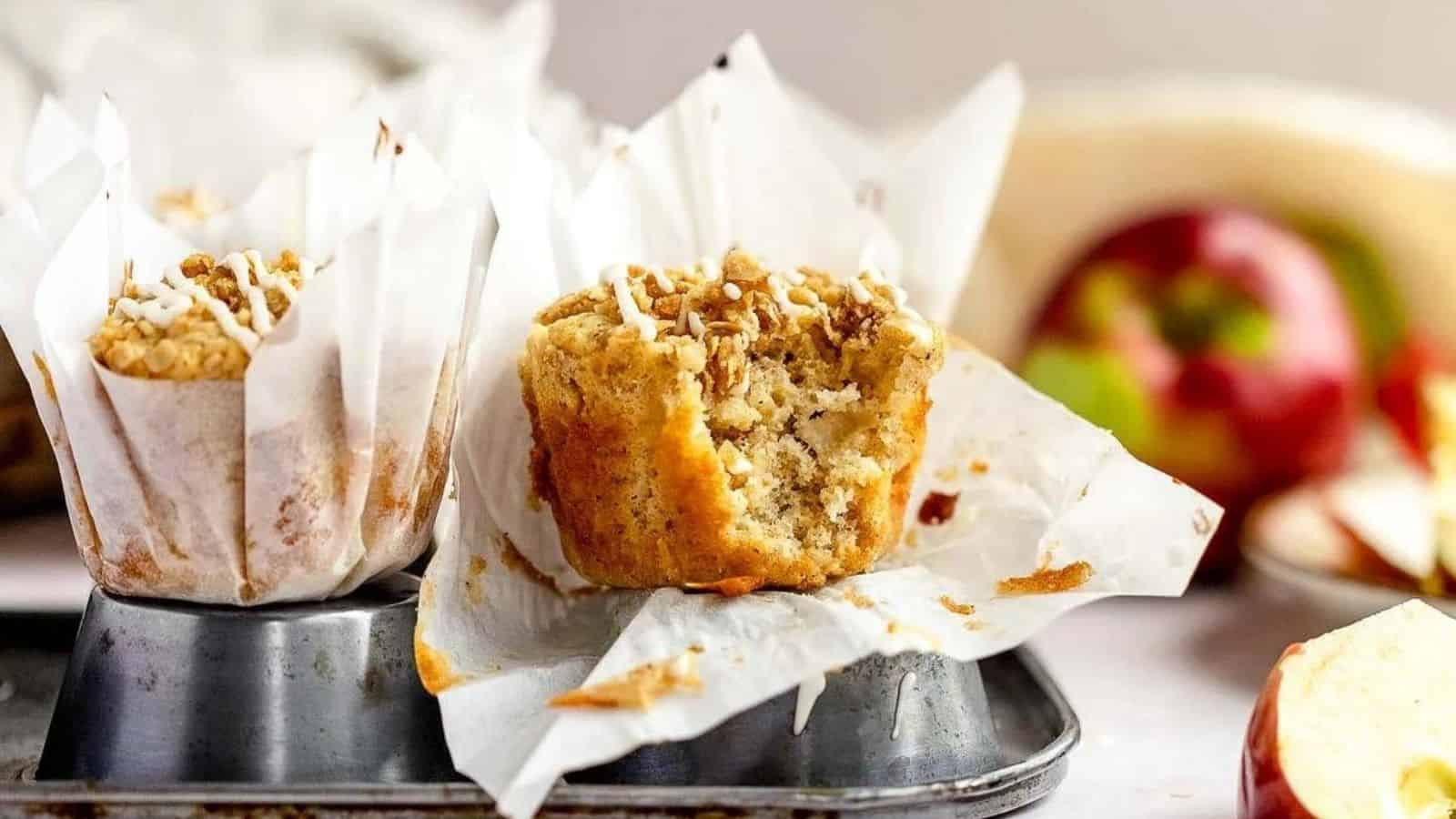 Apple cinnamon crumb muffins on top of the upside down molder.