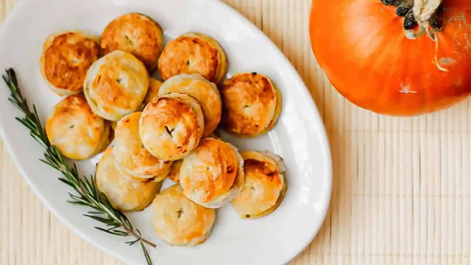 A plate of Autumnal Caramelized Onion & Pumpkin Puff Pastry Pockets.