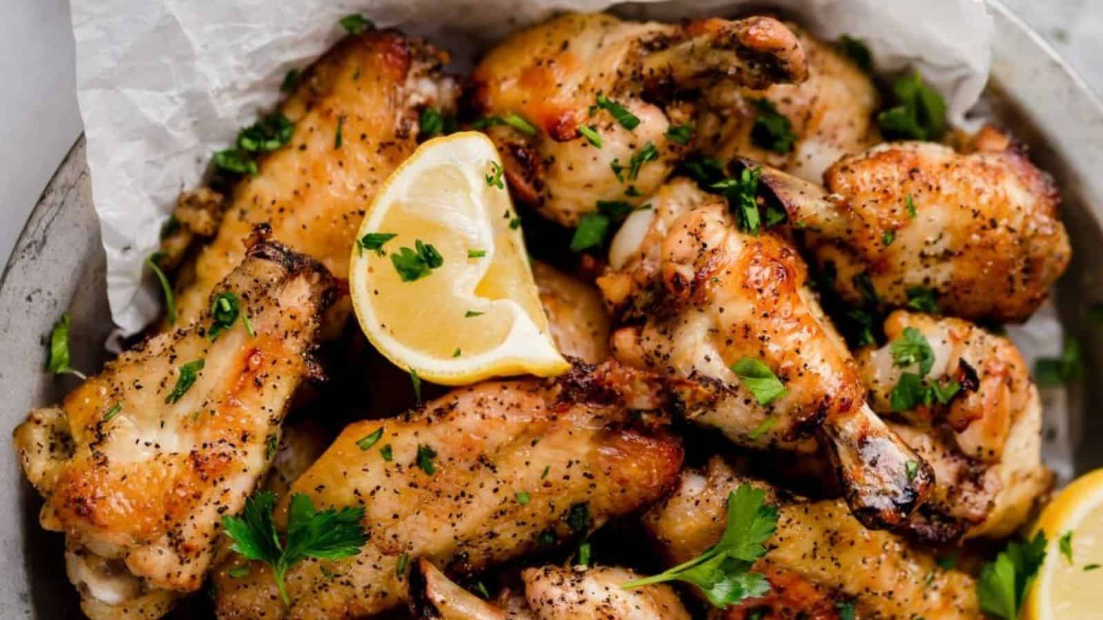 Close-up of baked lemon pepper wings.