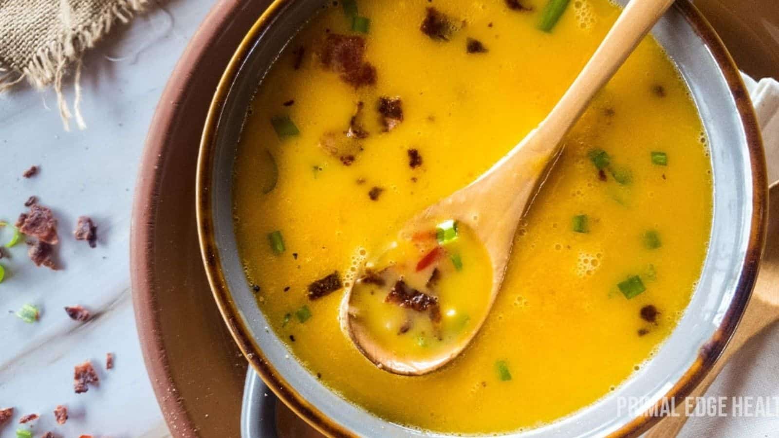 Soup with bacon, beer and cheese in a bowl.