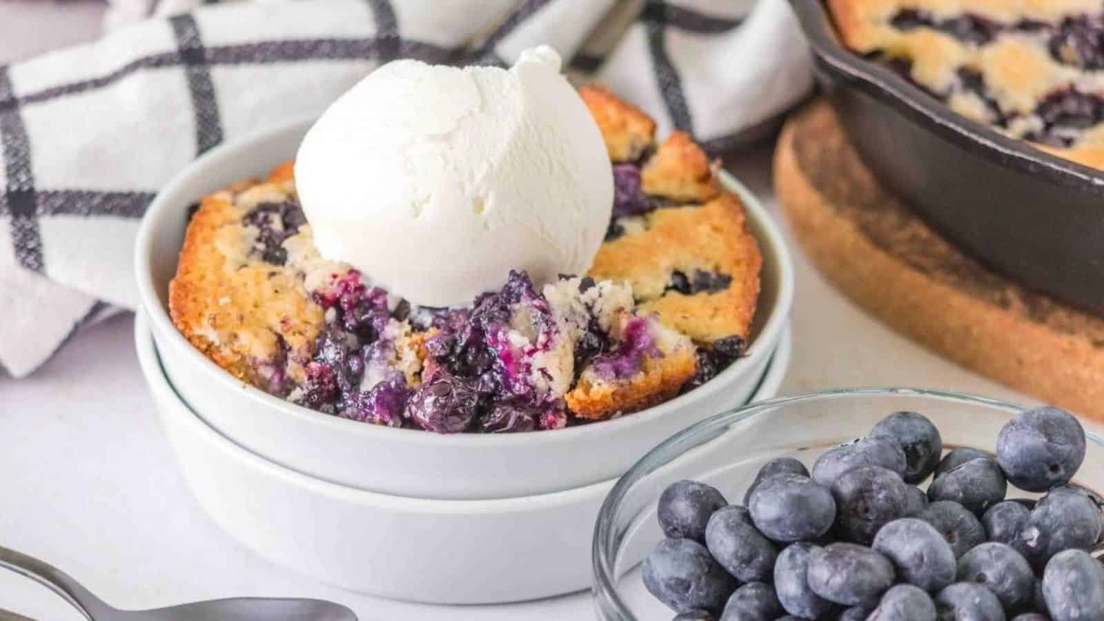 Bisquick Lemon Blueberry Cobbler in two stacks of bowls.