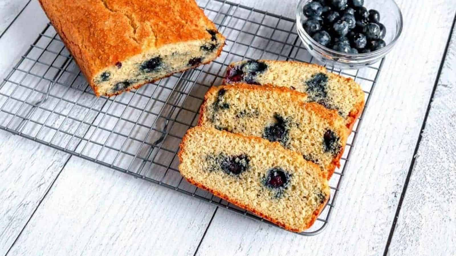 Blueberry bread on a cooling rack.