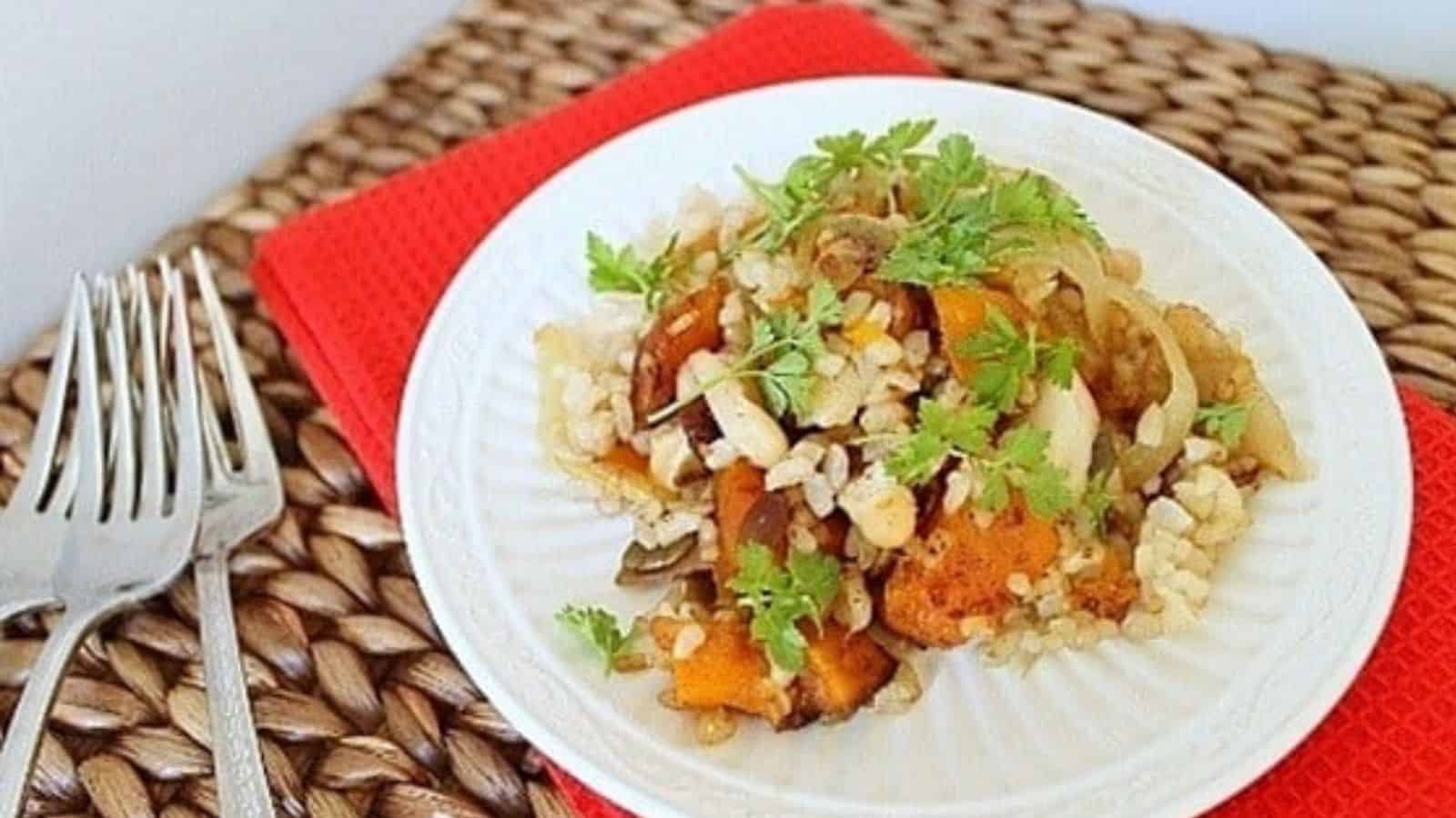 Butternut squash apple rice bake on a plate.