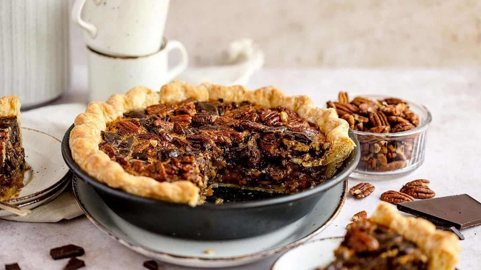 Close-up image of chocolate chunck pecan pie.