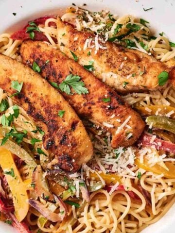 A plate of Copycat Olive Garden Chicken Scampi Pasta.