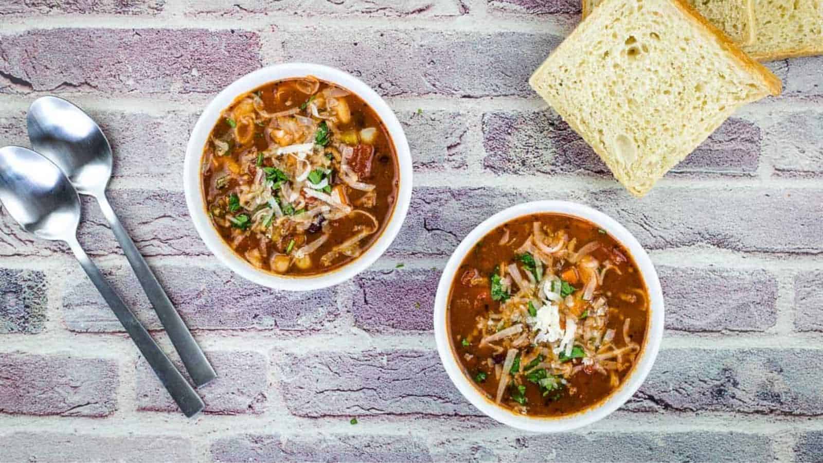 Two bowls of Copycat Pasta e Fagioli Soup.