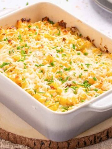 An image of corn casserole with cream cheese, ready to be served.