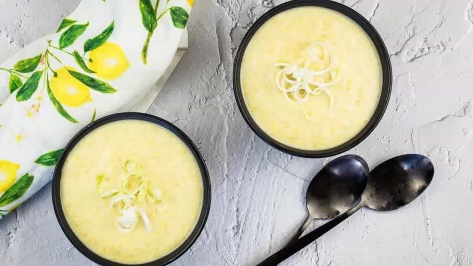 Two bowls of cream of leek and garlic soup.