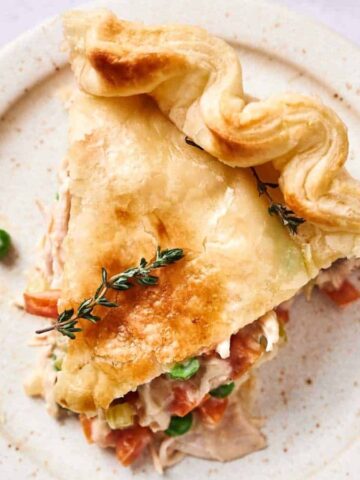 A slice of an easy Chicken Pot Pie on a plate.