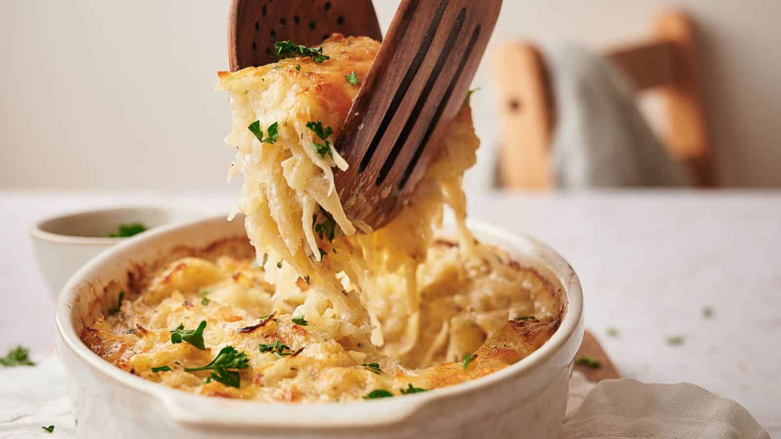 Hashbrown casserole being served.