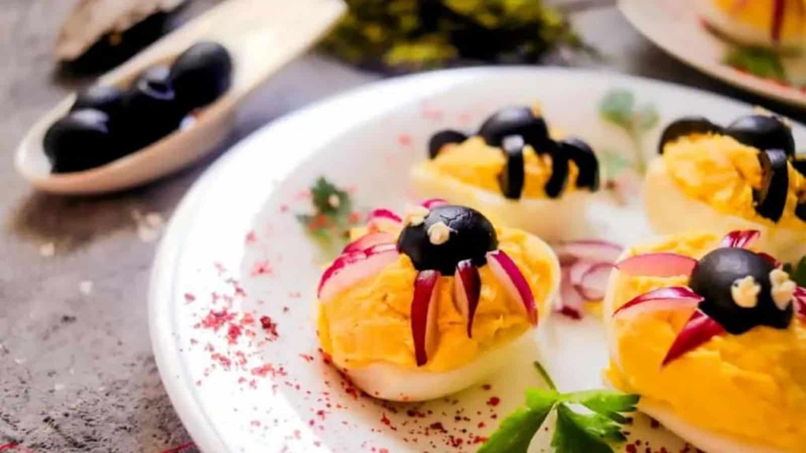 Keto spider deviled eggs in a plate.