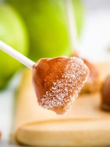 Mini Caramel Apples on a stick and dipped in sugar.