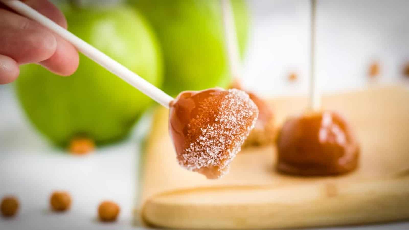 Mini Caramel Apples on a stick and dipped in sugar.