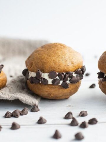 Three Pumpkin Whoopie Pies with Cream Cheese & Chocolate Chips.