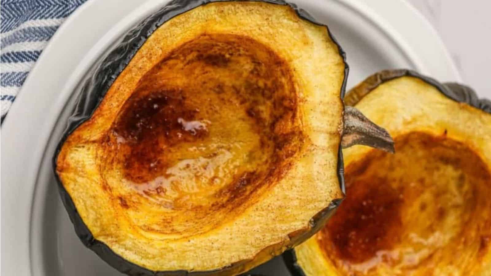 Roasted acorn squash on a plate.