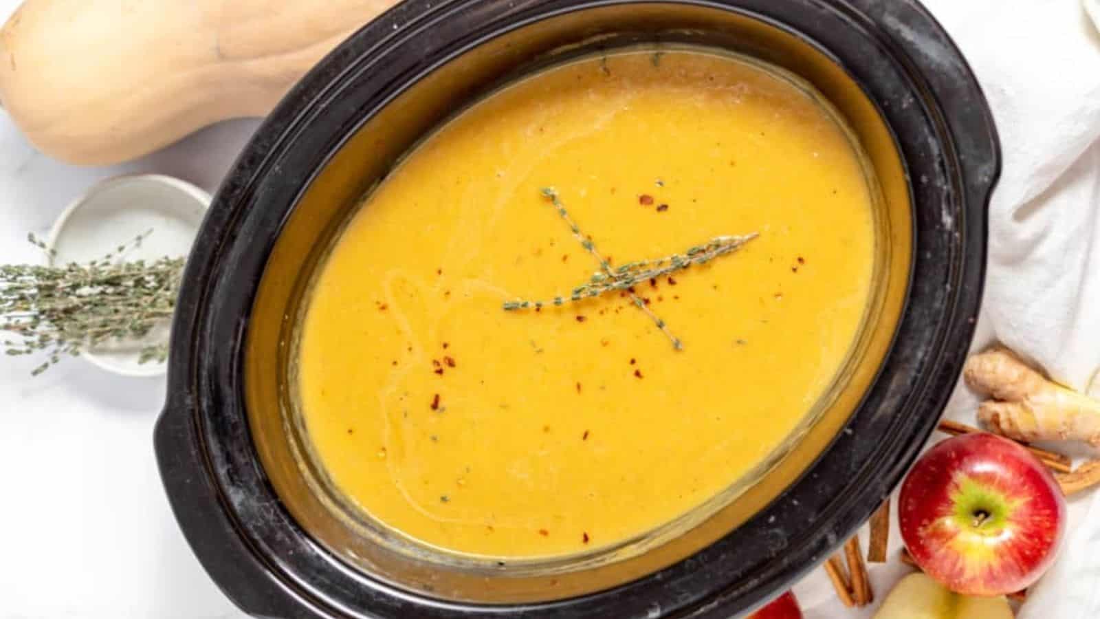 Overhead image of slow cooker butternut squash soup in a bowl.