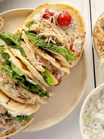 A plate of Slow Cooker Greek Chicken Gyros.