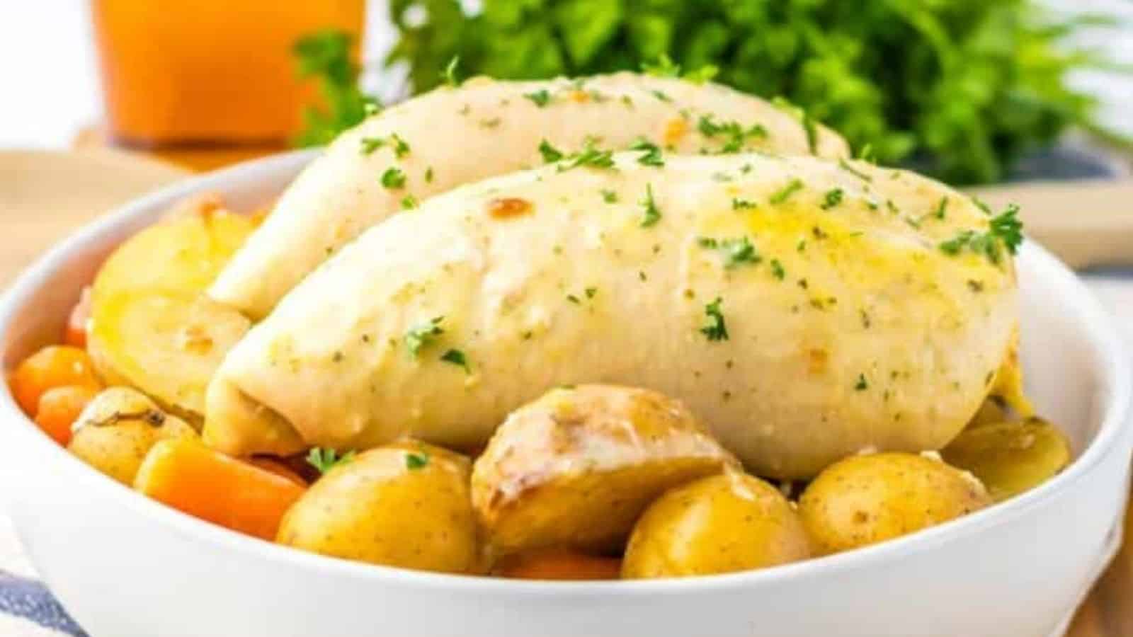 Close-up image of slow cooker ranch chicken in a bowl.