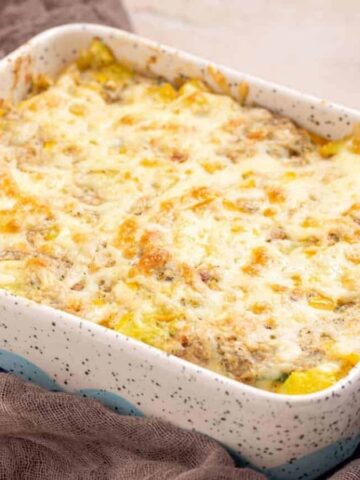 An image of Squash Casserole in a baking dish.