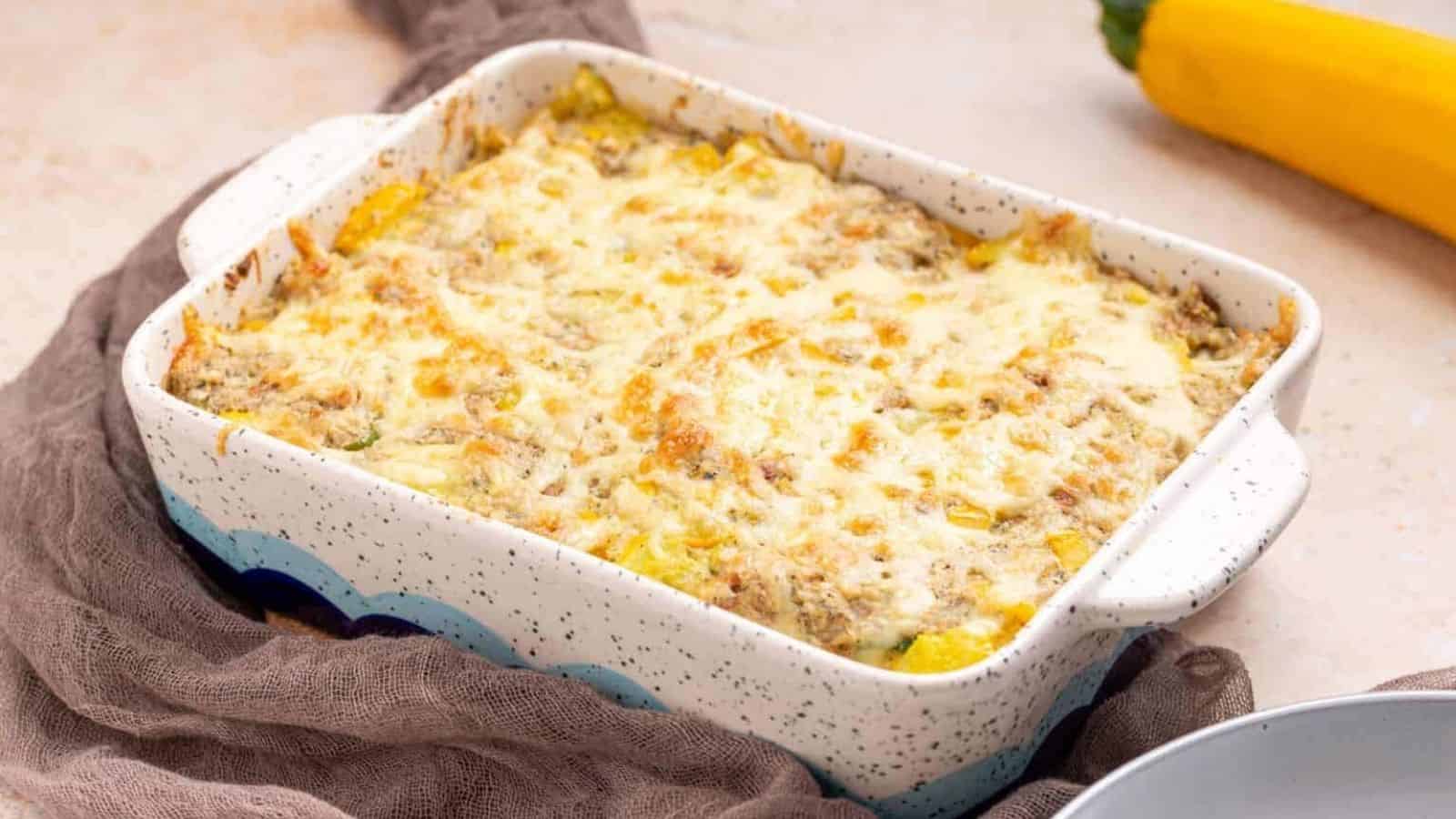 An image of Squash Casserole in a baking dish.