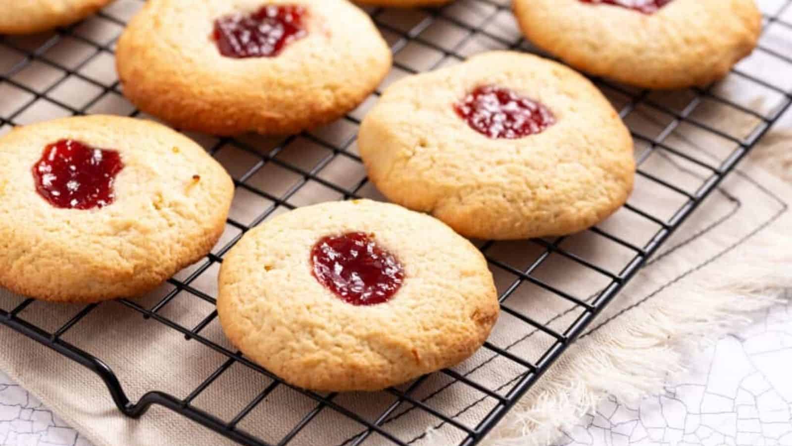 An image of strawberry lemonade cookies on a wire rack.