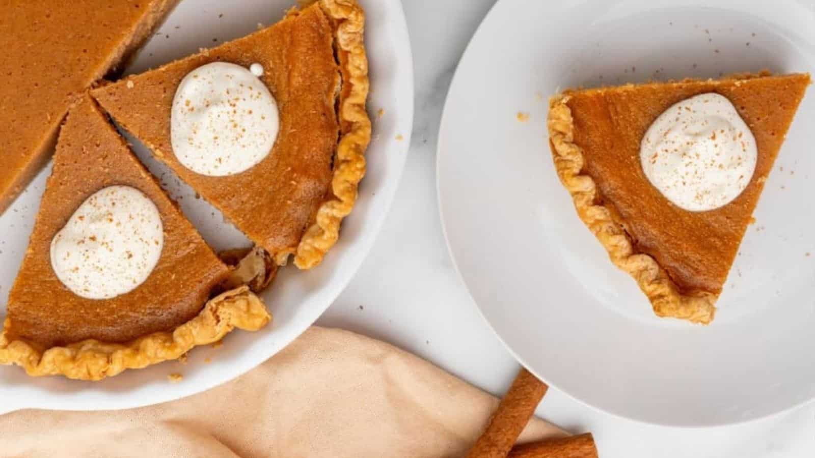 Top view of sliced sweet potato pie with condensed  milk in 2 separate plates.