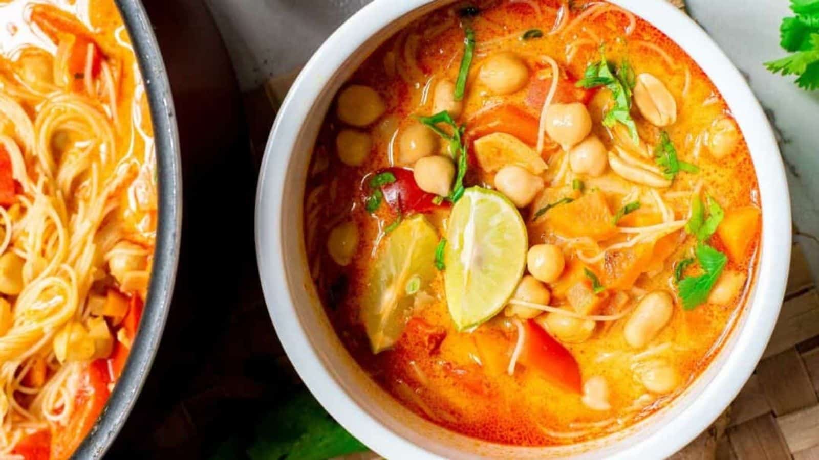 Overhead image of thai red curry soup in a bowl.