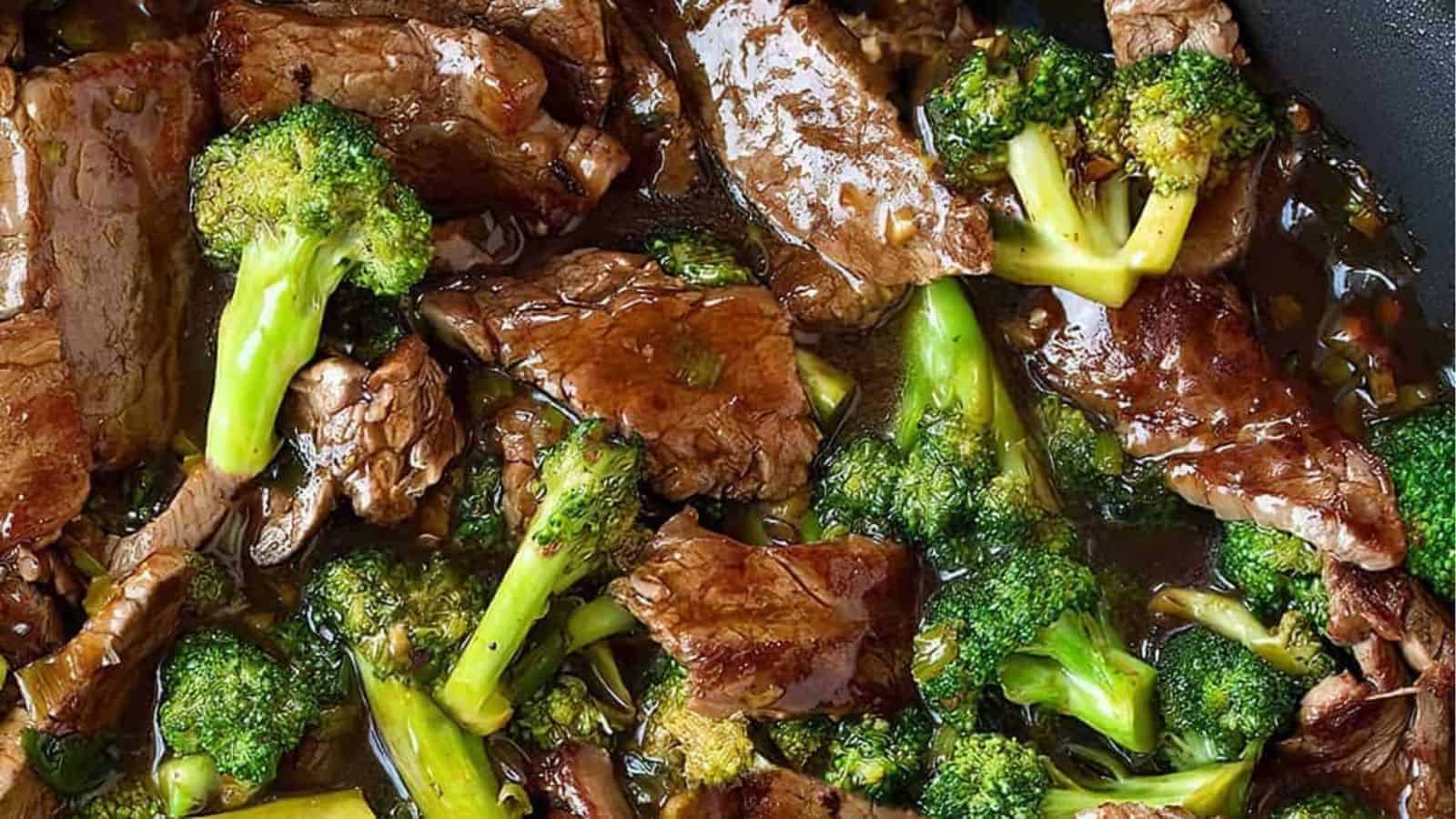 A pan of beef and broccoli stir fry with a brown sauce.