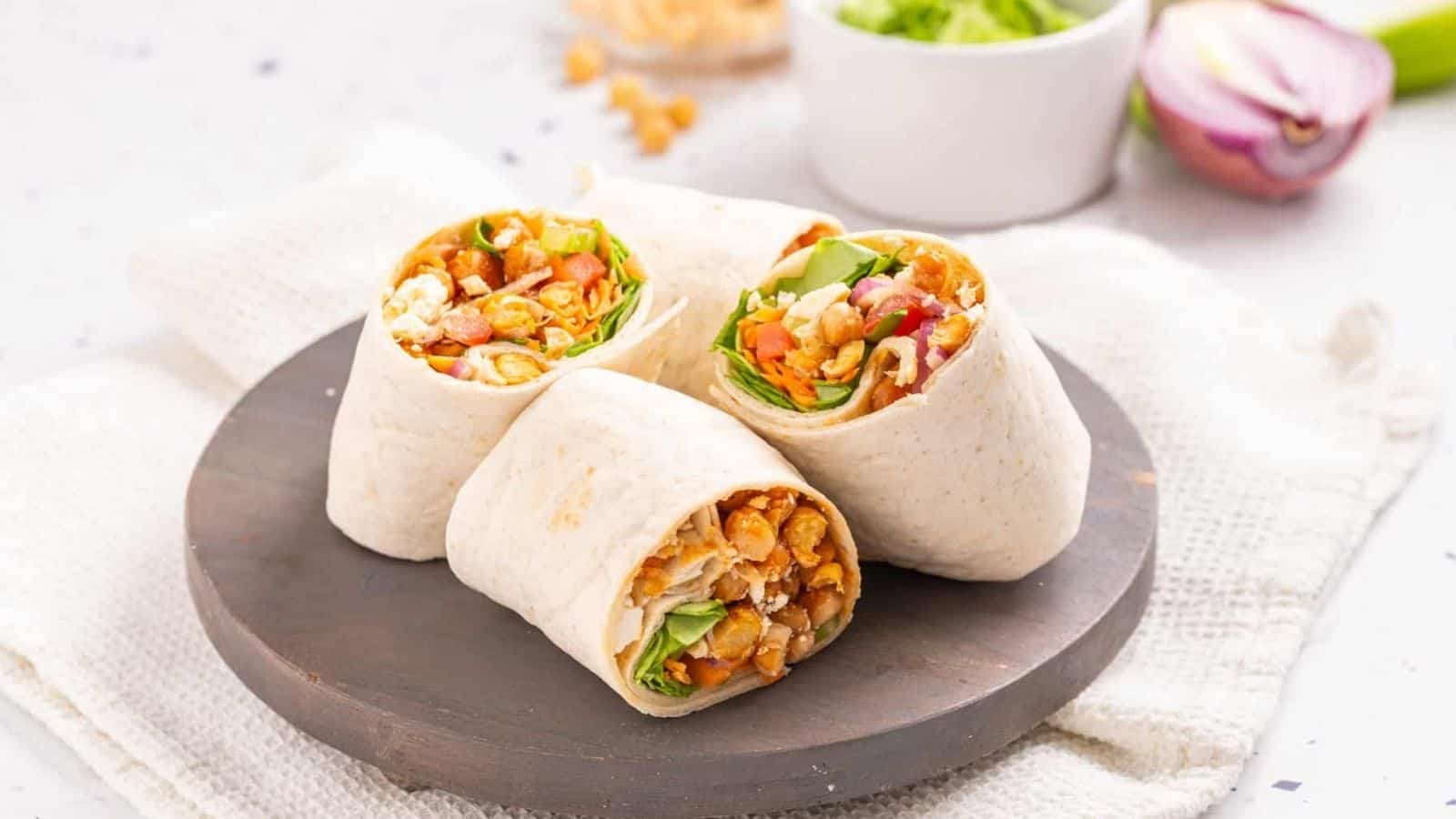 An image of buffalo chickpea wraps on a plate.