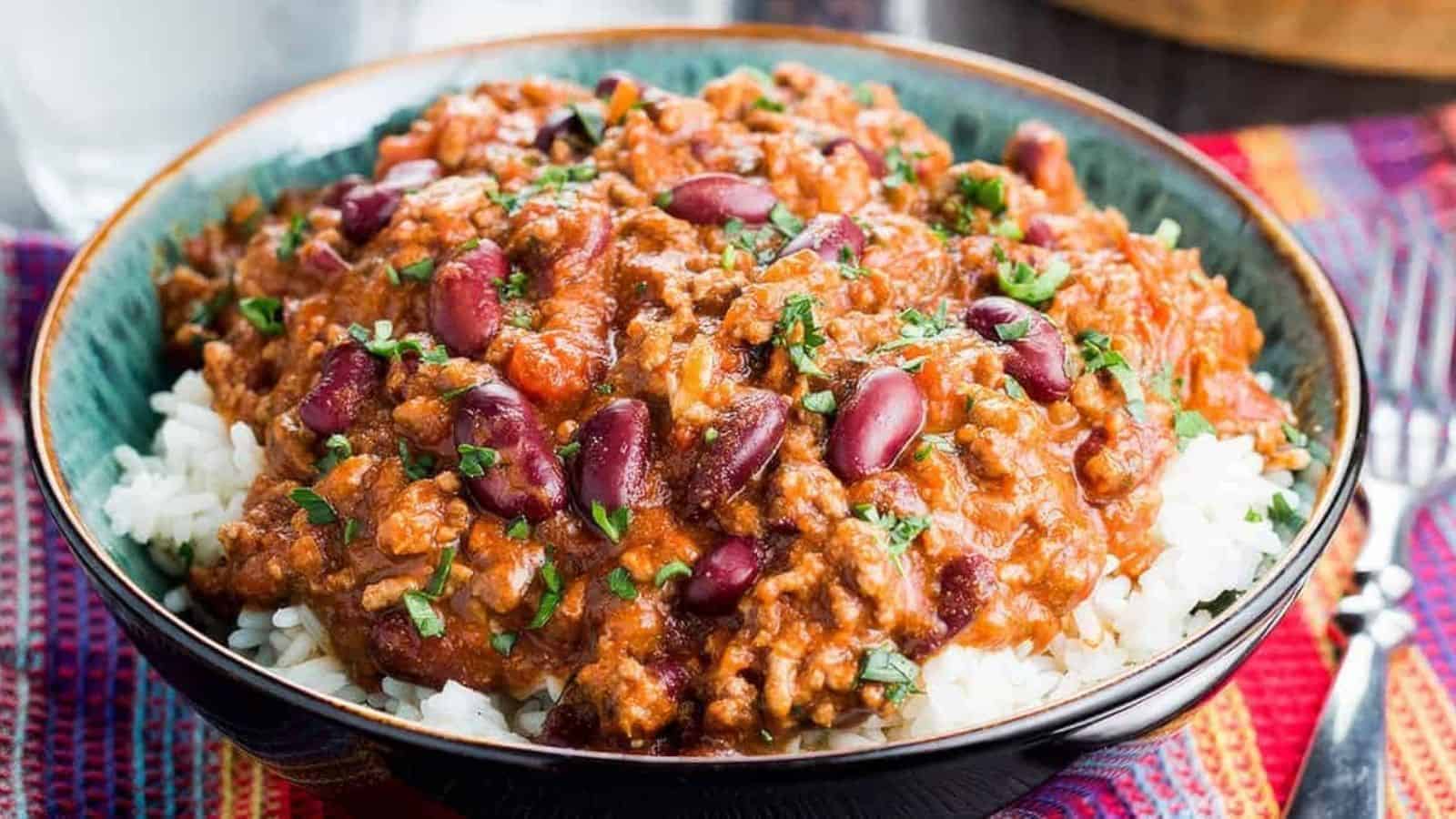 Classic Chili Con Carne served on a bed of white rice.