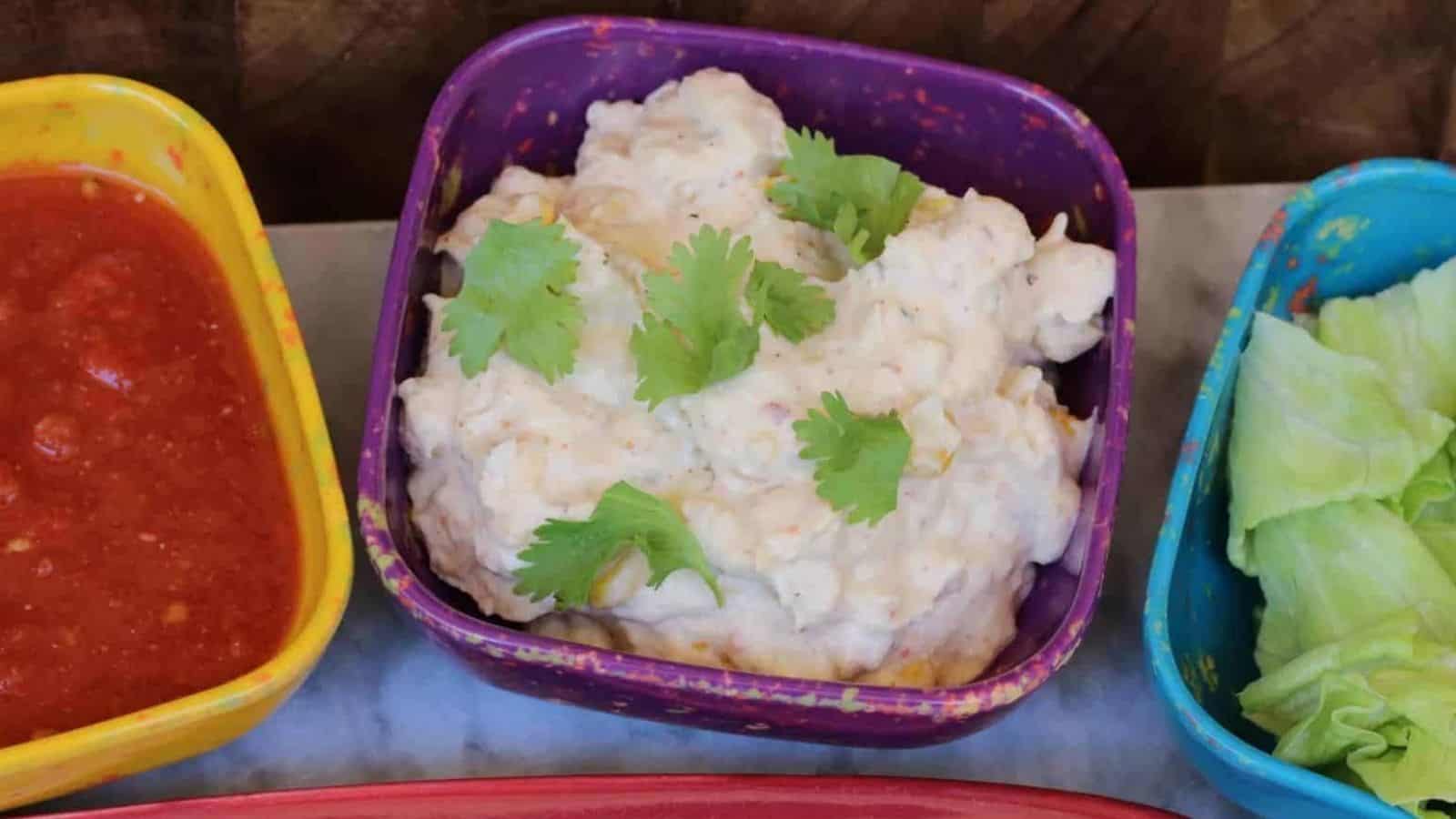 Bowl of dip with cilantro.