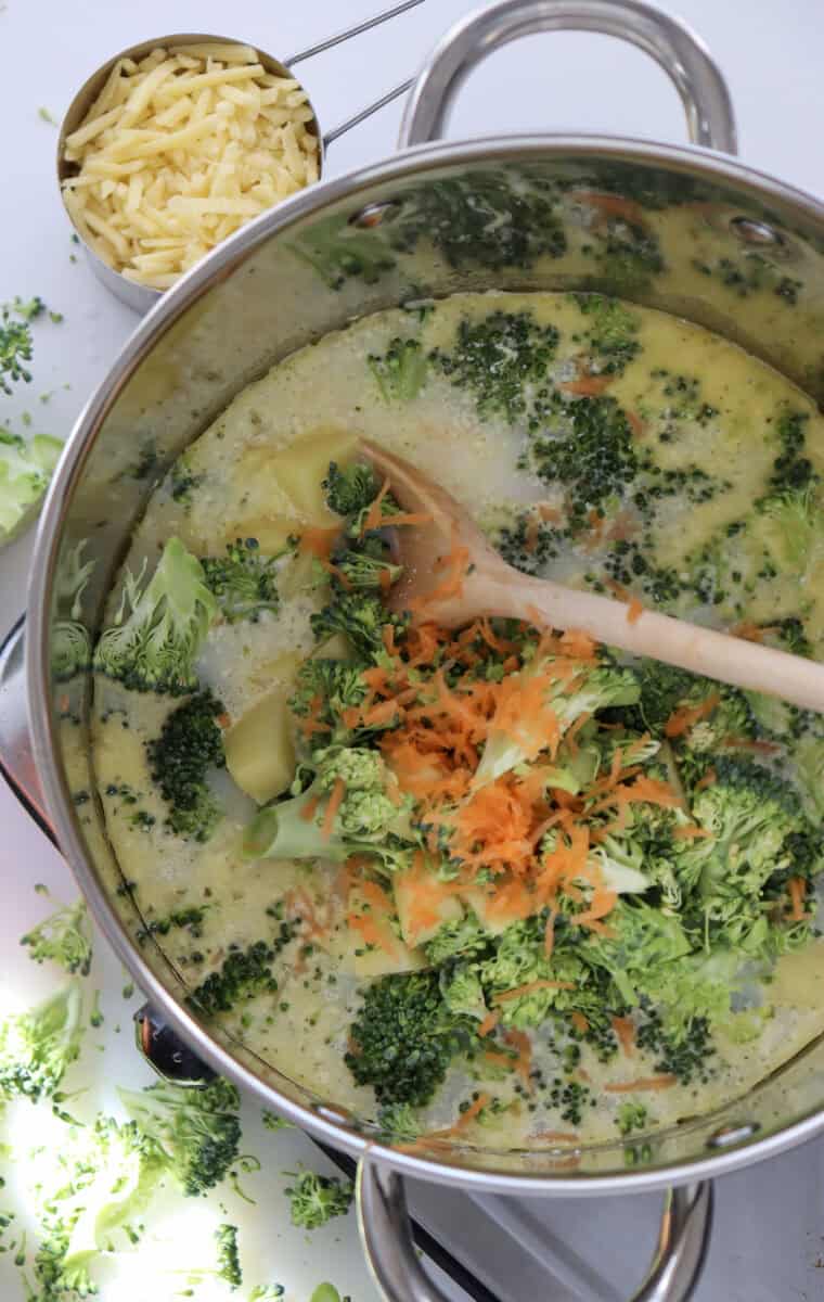 Top view of other ingredients being added to the soup.