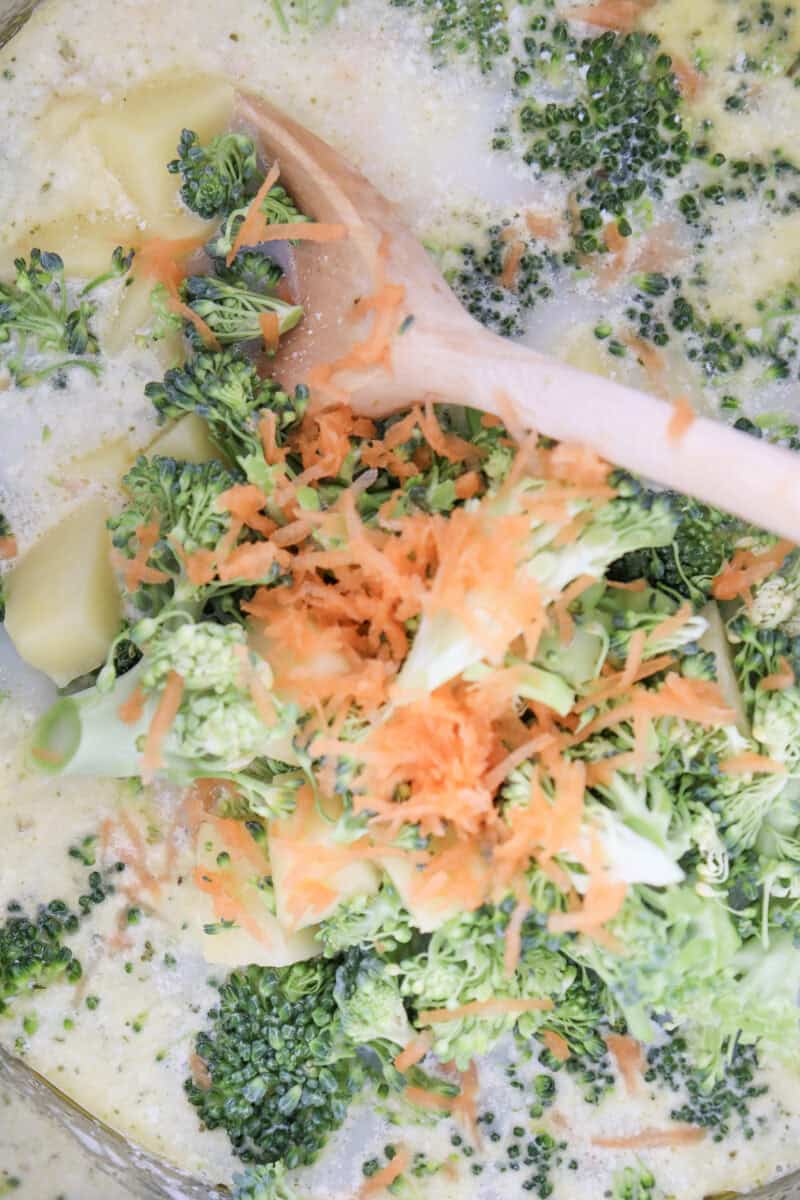 Close-up image of broccoli cheddar soup.