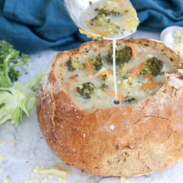 Close-up image of broccoli cheddar soup.