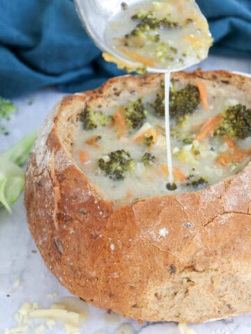 Close-up image of broccoli cheddar soup.