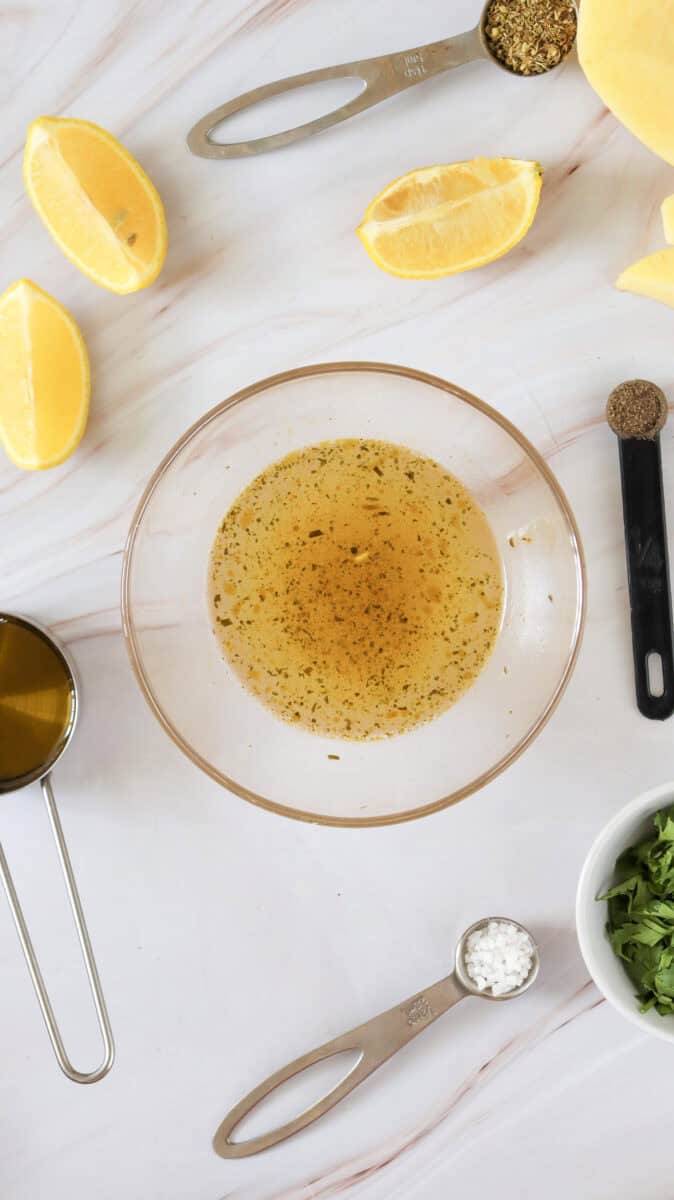 On overhead image of liquid mixture in a mixing bowl.