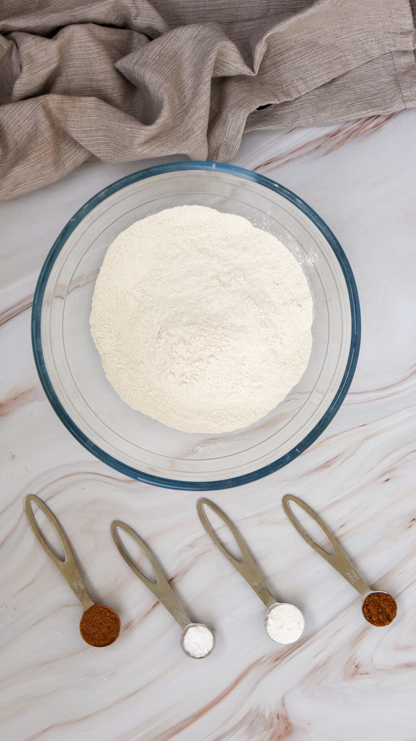 An overhead image of carrot cake muffins dry ingredients.