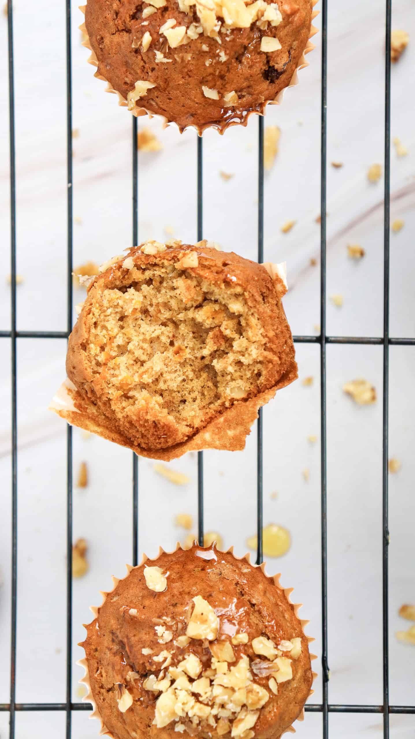 Carrot cake muffins on a cooling rack.