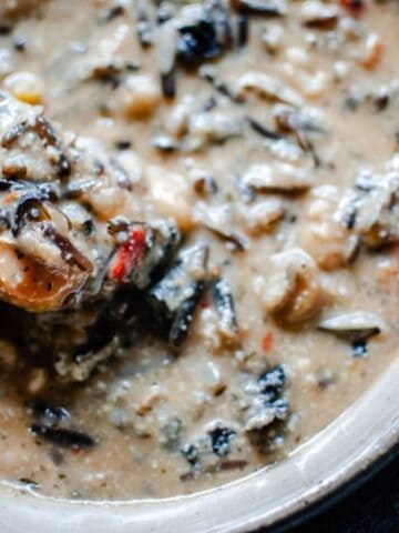 A close-up image of a bowl of Instant Pot Wild Rice Soup.