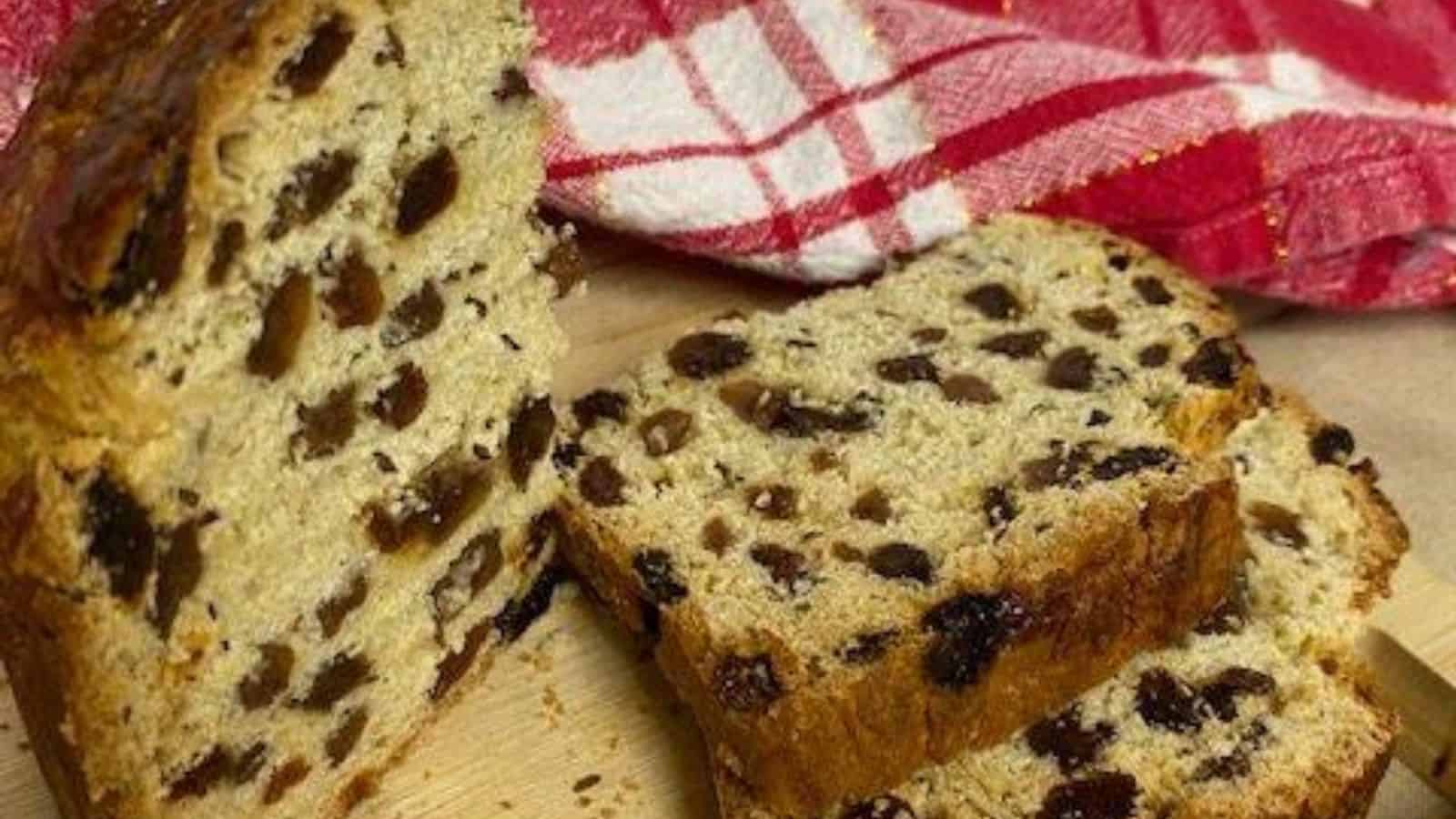 Sliced irish soda bread on a wooden board.