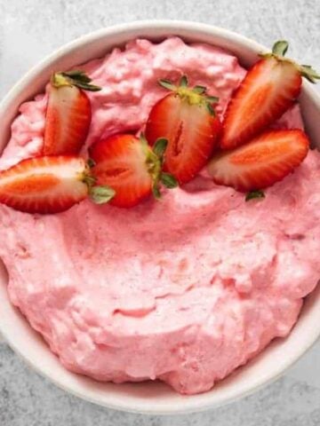 Top view of Jello Salad with fresh strawberries.