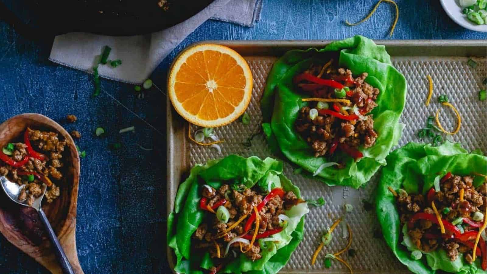 Overhead image of orange turkey asian lettuce wraps.