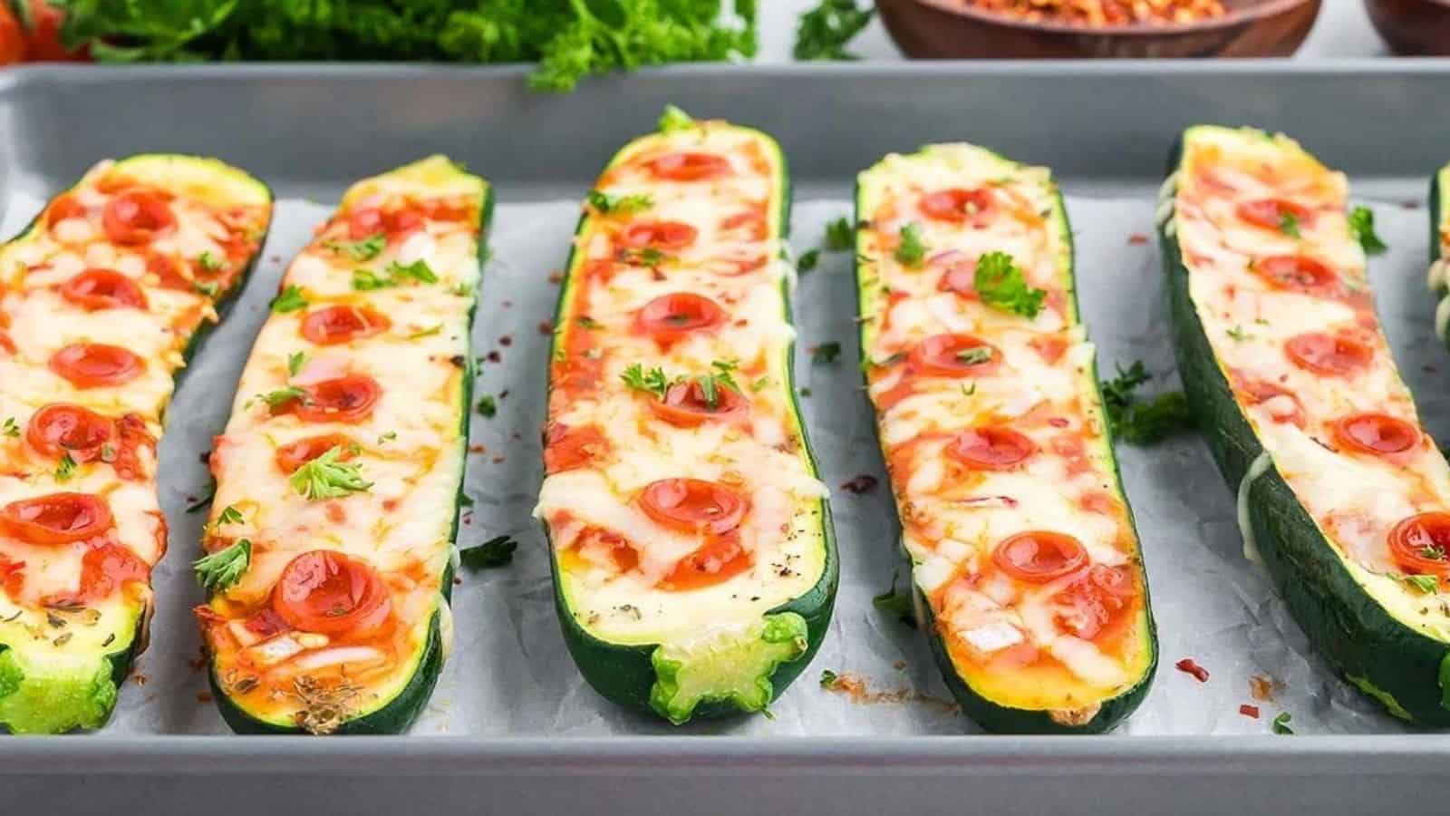 Close-up image of pizza zucchini boats in a dish.