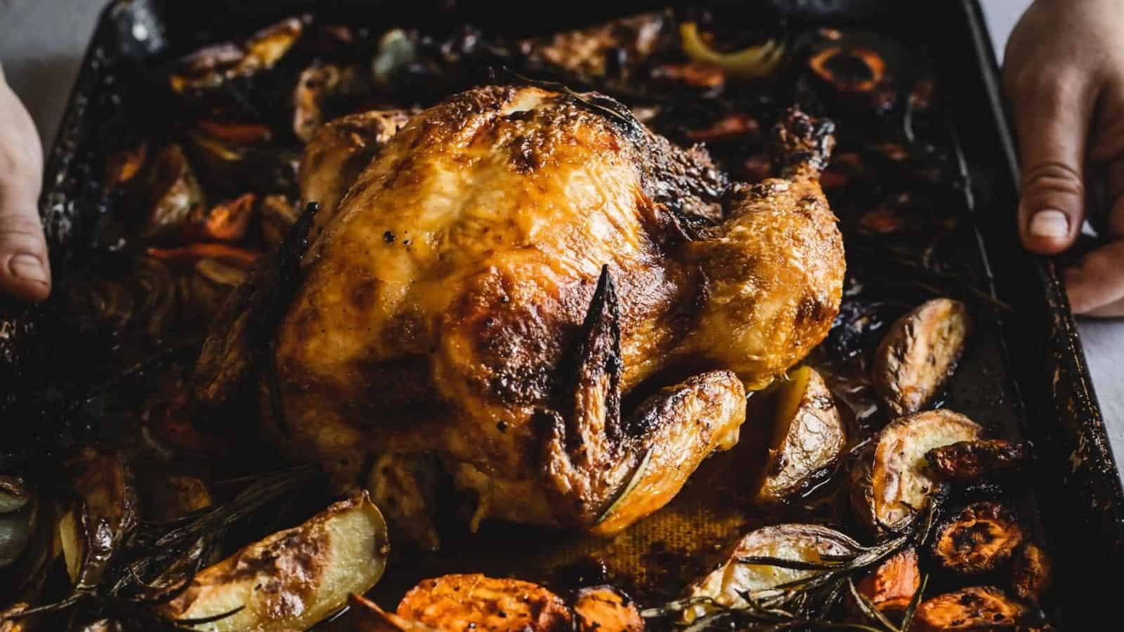 Close-up image of sheet pan paprika and chicken and veggies.