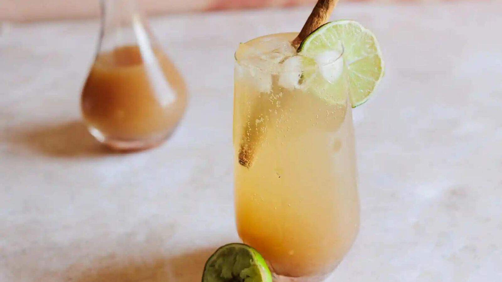 Close-up image of a glass of spicy and tangy tamarind cocktail.