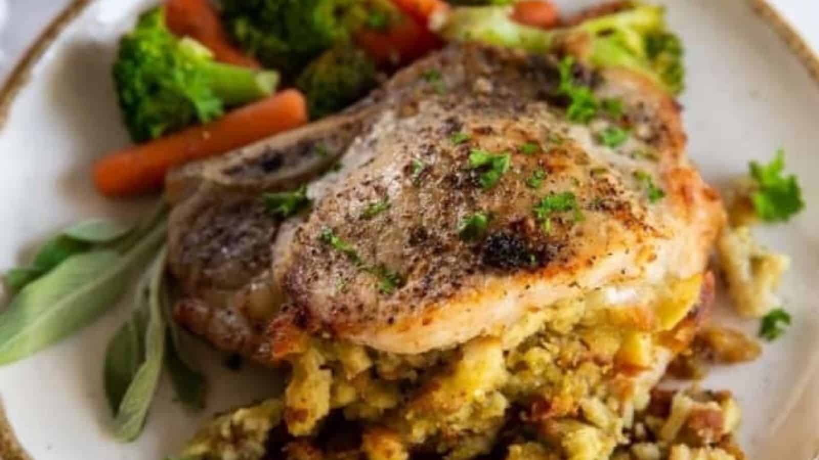 Close-up of stuffed pork chops on a plate.