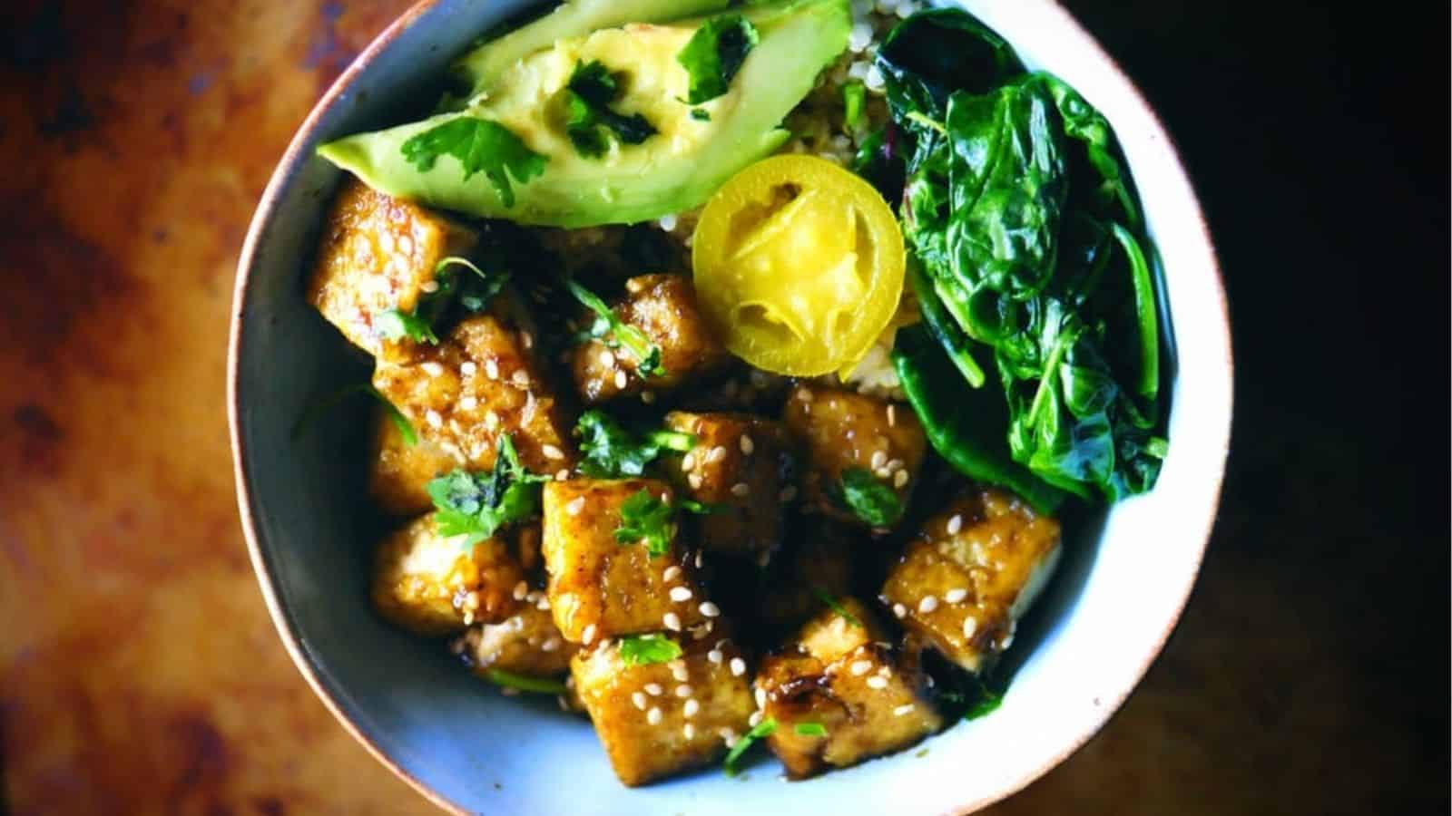 Top view of sweet and spicy gree tofu quinoa bowl.